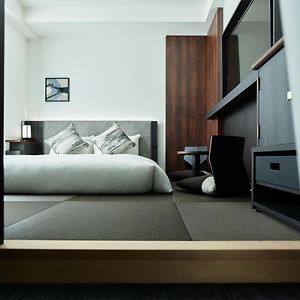 Kamer met een Queen Size Bed in Japanse Stijl